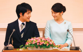 הנסיכה מאקו וארוסה קיי קומורו (צילום: SHIZUO KAMBAYASHI, AFP via Getty Images)