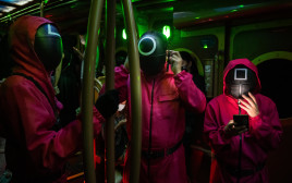 תחפושות "משחק הדיונון" בליל כל הקדושים (צילום: Getty images)