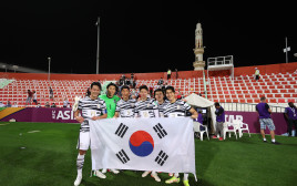 שחקני נבחרת דרום קוריאה חוגגים עלייה למונדיאל 2022 (צילום: GettyImages, Matthew Ashton - AMA)