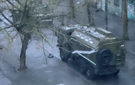 כוחות רוסים בחרסון (צילום: FROM VIDEO OBTAINED BY REUTERS/via REUTERS)