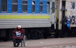 פליטים מאוקראינה (צילום: REUTERS/Kai Pfaffenbach)