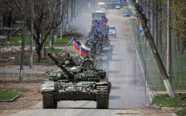 כוחות רוסים באוקראינה (צילום: REUTERS/Chingis Kondarov)