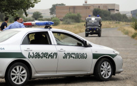 משטרת גיאורגיה (צילום: REUTERS/Irakli Gedenidze)