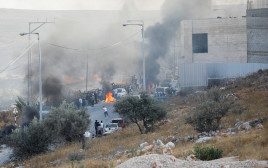 עימותים ביהודה ושומרון (צילום: REUTERS/Raneen Sawafta)