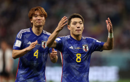 ניצחון על קוסטה ריקה ישים אותם עם רגל וחצי בשמינית הגמר. שחקני יפן (צילום: רויטרס)