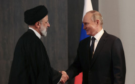 ולדימיר פוטין ואבראהים ראיסי, נשיא איראן (צילום: Sputnik/Alexandr Demyanchuk/Pool )