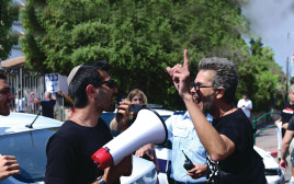 עימות בין פעילי שמאל וימין (צילום: תומר נויברג, פלאש 90)
