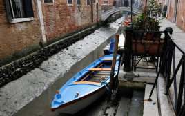 בצורת בוונציה (צילום: REUTERS/Manuel Silvestri)