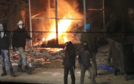 תיעוד מהמהומות בחווארה (צילום: צילום מסך רויטרס)
