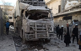 פיצוץ בעיר דיר א-זור בסוריה, במבנה המשמש את המיליציות הפרו-איראניות (צילום: רשתות ערביות)