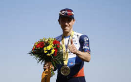 מייק וודס רוכב אופניים קנדי, ישראל פרמייר טק, מנצח הקטע התשיעי של טור דה פראנס 2023 (צילום: רויטרס)