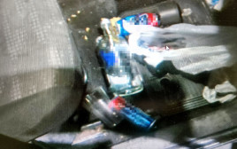 המשקה האלכוהולי שנתפס אצל הנהג מהצפון שנהג ללא רישיון (צילום: דוברות המשטרה)
