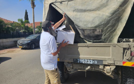 יניב וענונו (צילום: ארנולד נטייב)