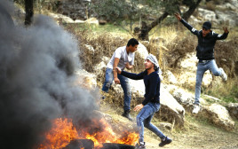 פלסטינים (צילום: נאסר אישתיה, פלאש 90)