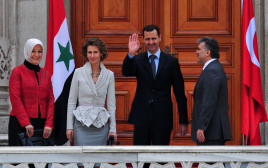 בשאר אסד ורעייתו אסאמא (צילום: AFP via Getty Images)