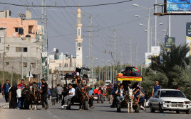 תושבי עזה בצפון הרצועה (צילום: REUTERS/Mohammed Salem)