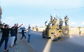 פעילי חמאס  ב-7 באוקטובר (צילום: עטיה מוחמד פלאש 90)