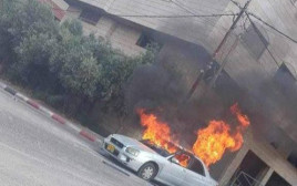 רכב ישראלי שהוצת בקלקיליה (צילום: רשתות ערביות)