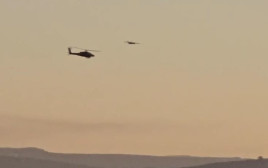 מסוק צה"ל ליד כטב"ם בקריות (צילום: רשתות חברתיות, שימוש לפי סעיף 27 א')