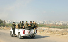 מחבלי חמאס ב-7 באוקטובר (צילום: MOHAMMED ABED.GettyImages )