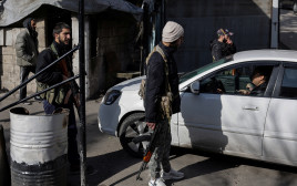 חמושים בסוריה (צילום: REUTERS/Zohra Bensemra)