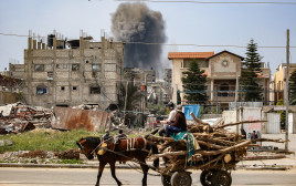 תקיפה בעזה (צילום: EYAD BABA/AFP via Getty Images)