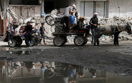 תושבי רצועת עזה (צילום: REUTERS/Mahmoud Issa)