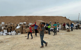 חלוקת הסיוע ההומניטרי בעזה (צילום: ללא קרדיט)