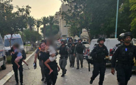 הפגיעה הישירה בבאר שבע (צילום: דוברות המשטרה)
