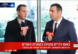 ברק רביד עם ירון אברהם בניו יורק (צילום: צילום מסך ערוץ 12)