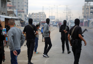 מחבלי חמאס (צילום: EYAD BABA/AFP via Getty Images)