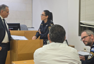 פרשת "יד לוחצת יד" (צילום: דוברות המשטרה)