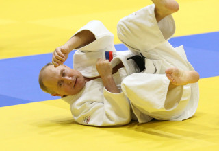 פוטין במהלך אימון ג'ודו (צילום: GettyImages, Mikhail Svetlov)