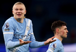 ארלינג הולאנד ופודן (צילום: Carl Recine / Staff)