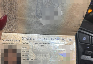 דרכונה הקרוע של מ' (צילום: ללא קרדיט)