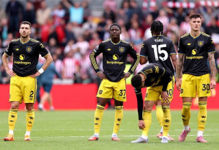 קובי מאינו ושחקני מנצ'סטר יונייטד (צילום: Justin Setterfield)