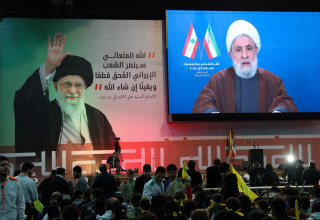 נעים קאסם נואם (צילום: רויטרס)