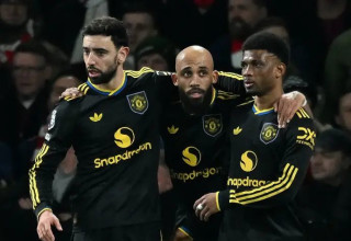 קבוצת תמיכה: אצל מייקל קאריק אתה לא עולה לדשא בידיעה שהפסד הוא בגדר אופציה (צילום: רויטרס)