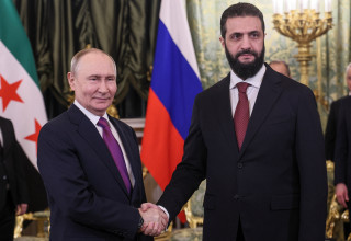 אחמד אל שרע, ולדימיר פוטין בפגישה במוסקבה (צילום: רויטרס)