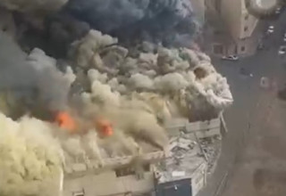 שרפה בשוק במערב טהרן (צילום: צילום מסך רשת X)