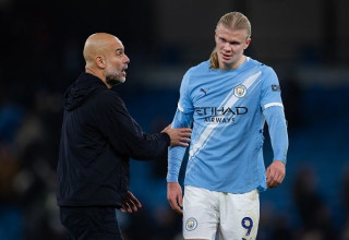 ארלינג הולאנד ופפ גווארדיולה (צילום: Visionhaus)