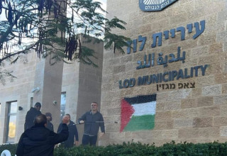 גרפיטי של דגל פלסטין על בניין עיריית לוד (צילום: שימוש לפי סעיף 27א')