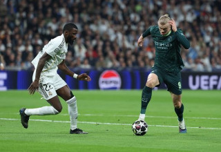 ארלינג הולאנד מול אנטוניו רודיגר (צילום: THOMAS COEX / Contributor)