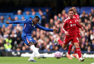 מויסס קאיסדו מול אלכסיס מקאליסטר (צילום: Justin Setterfield / Staff)