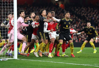 שחקני מנצ'סטר יונייטד וארסנל (צילום: Alex Pantling / Staff)