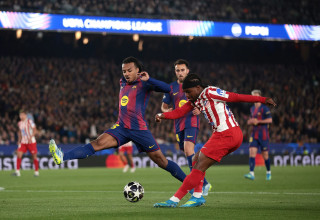 לוקמן שחקן אתלטיקו מדריד מול קונדה שחקן ברצלונה (צילום: GettyImages)