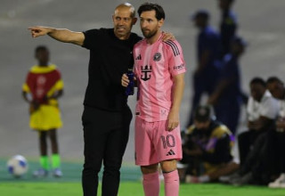 מסי ומסצ'ראנו (צילום: Gettyimages)