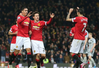 אנחל די מריה, אנדר הררה וכריס סמולינג במדי מנצ'סטר יונייטד (צילום: Matthew Peters)