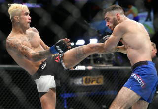 לוחם ה-UFC גודופרדו פפה (משמאל) (צילום: GettyImages)