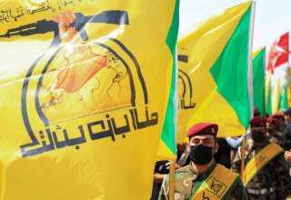 הלוויה של המיליציות האיראניות בעיראק (צילום: רויטרס)